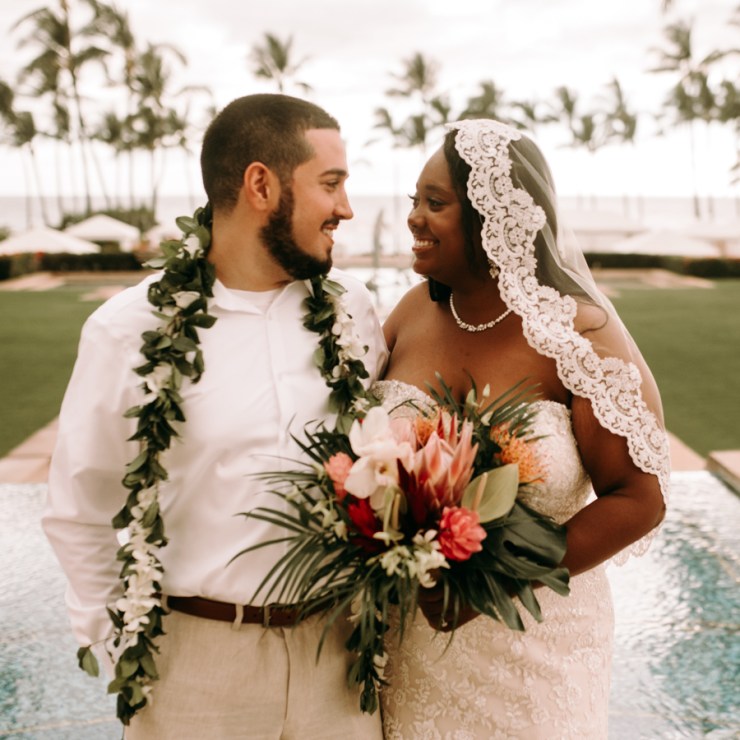 bride and groom looking at each other lovingly